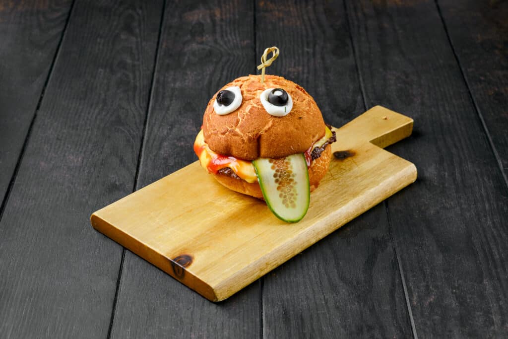 hamburger with face on wooden board lookin goofy as heck - Website navigation shouldn't feel like a maze! Uncover the pitfalls to avoid, savvy strategies to embrace, and the hottest trends that are shaping the digital landscape. Goodbye, visitor confusion! Hello, conversion success! Navigate your way to a user-friendly website and watch your business grow. - What are the key principles of effective website navigation? - your wp guy